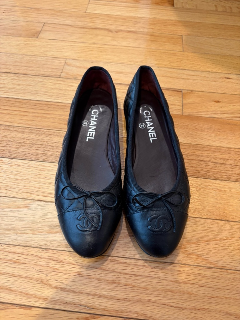 CHANEL Black Quilted Leather Ballet Flats with CC Emblem